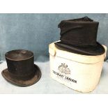 A fine condition boxed silk top hat by Tress & Co of London; and a worn top hat by DM Dunlop of