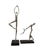 Two contemporary metal figurative sculptures on ebonised plinths - mother swinging child, and