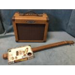 A cigar box guitar with single pickup and oak neck; and a Kustom 16W guitar amplifier. (2)