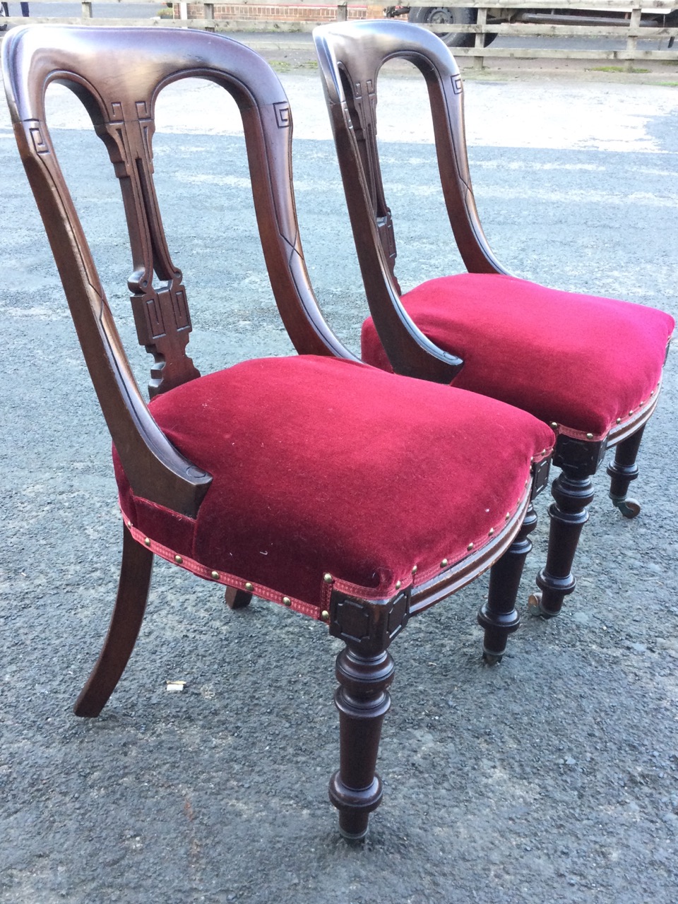 A pair of late Victorian mahogany dining chairs with shaped moulded backs framing pierced splats, - Image 2 of 3