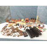 A set of O-gauge railway track, and various Tri-ang station pieces including platforms, sheds,