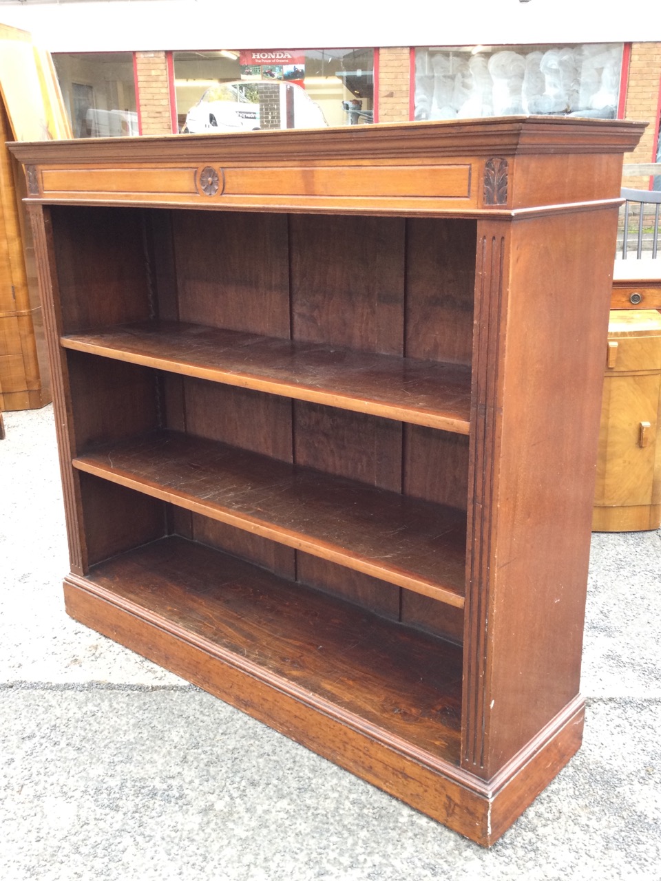 A late Victorian mahogany open bookcase, the rectangular top with moulded cornice above a panelled - Image 3 of 3