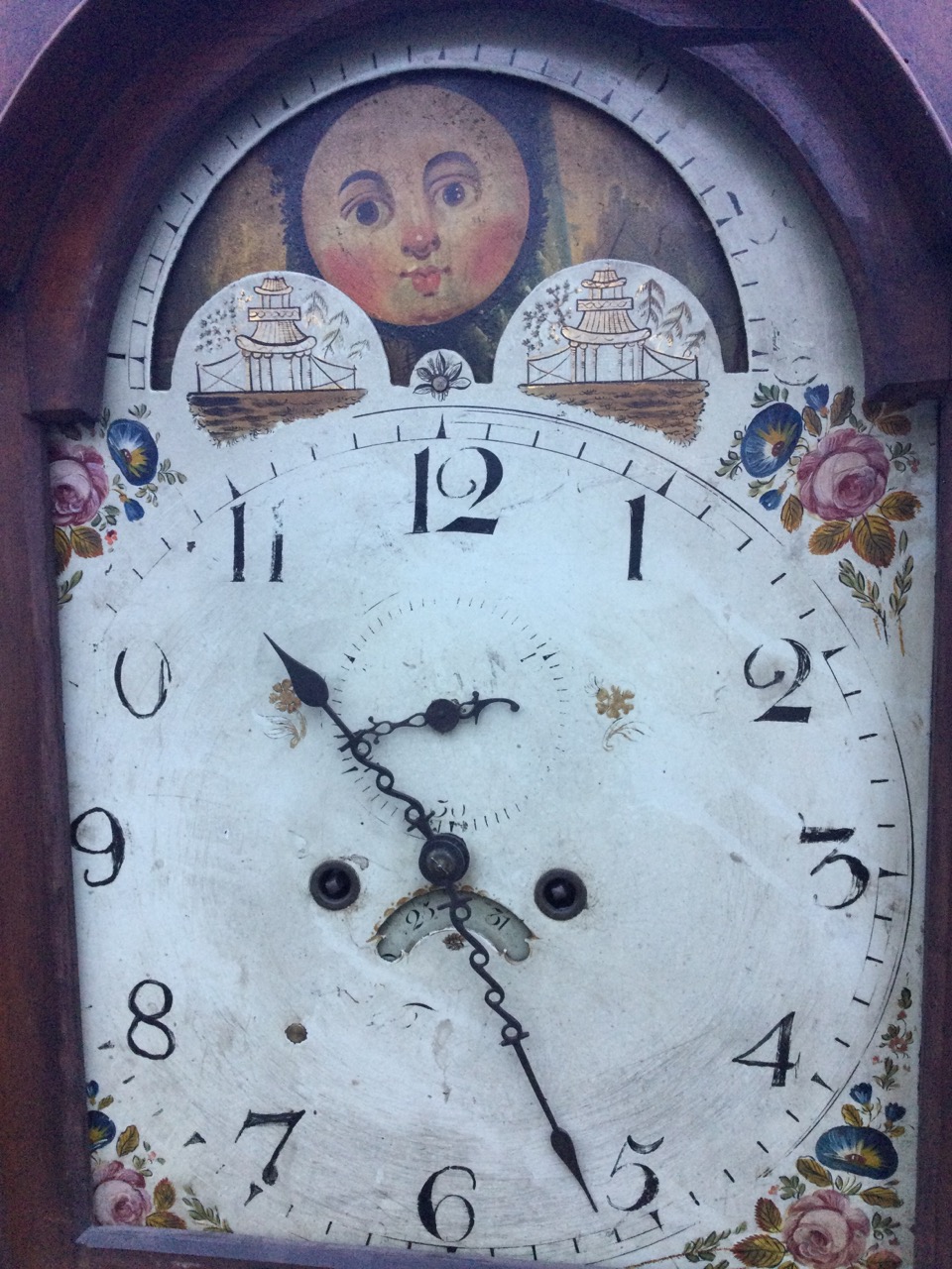A nineteenth century mahogany longcase clock, the painted moonphase arched dial with floral - Image 2 of 3