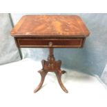 A reproduction mahogany occasional table, the rectangular rounded crossbanded top inlaid with