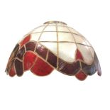 A leaded style bowl shaped shell lampshade with red scrolled & scalloped border. (15.5in dia)