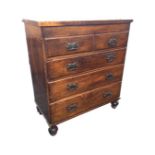 A Victorian stained oak chest of drawers, the rectangular top above two short and three long drawers