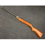 A Chinese Pioneer .22 air rifle, numbered ART-G6239, with stained wood stock. (42.5in)