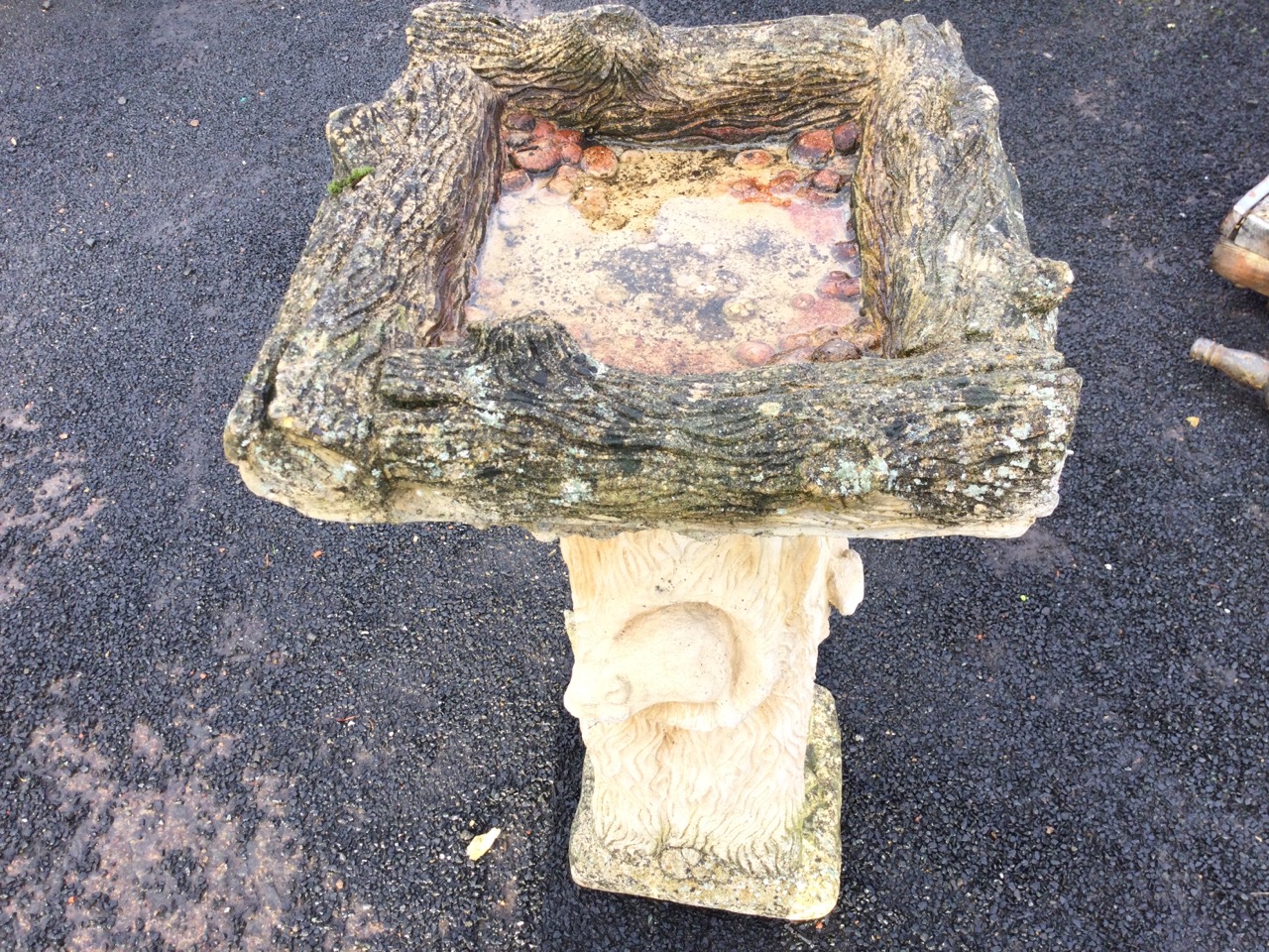 A composition stone garden birdbath moulded as logs, with square bowl on column cast with squirrels. - Image 2 of 3