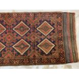 Eastern runner with geometric decoration on red and blue ground, 249cm x 78cm