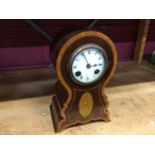 Inlaid wooden chiming mantle clock with pendulum and guilt framed wall clock