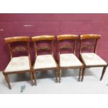 Set of four Regency mahogany dining chairs with carved bar backs and drop in floral tapestry seats o