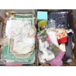 Two boxes of mixed vintage items including packaged ties, silk scarves, lingerie, lace, crochet and