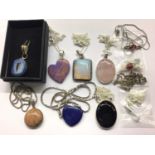 Group silver and white metal mounted semi precious stones and gem set pendants on chains
