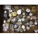 Collection of vintage wristwatch and pocket watch parts and movements in wooden box