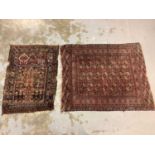 Two Eastern rugs with geometric decoration, 148cm x 119cm and 120cm x 86cm