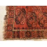 Eastern rug with geometric decoration on red and blue ground, 270cm x 216cm