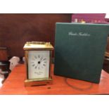 Charles Frodsham brass cased carriage clock in original box