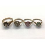 Four 9ct gold gem set cluster rings