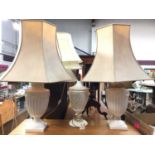 Pair of white glazed table lamps with shades, another similar and assorted shades