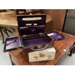 Early 20th century purple leather writing case with fitted interior, together with a leather jewel c