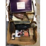 Two boxes of sundries, including a camera, binoculars, vintage handbags, etc