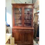 Victorian mahogany two height bookcase with adjustable shelves above enclosed by two glazed doors, t
