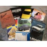 Two boxes of ephemera including quantity of car manuals