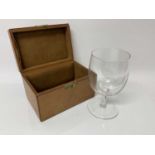 Drew & Sons brown leather case containing a good quality glass goblet with engraved initials, P.H.W.