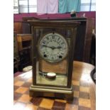 Late 19th century American 8 day mantel clock in brass four-glass case by New Haven Clock Co.