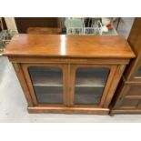 Victorian inlaid walnut display cabinet enclosed by two arched glazed doors