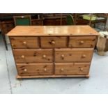 Large pine chest of seven drawers, 135cm wide, 48cm deep, 86cm high
