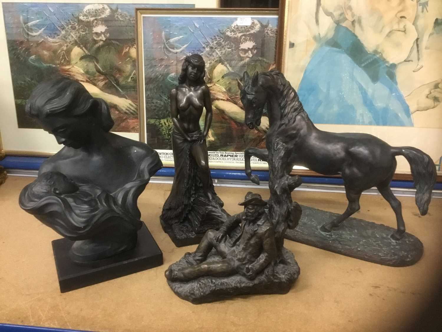 Group of four bronze resin and similar statues