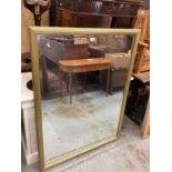 Large bevelled wall mirror in gilt effect frame, 100cm x 131cm