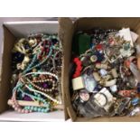 Large quantity of costume jewellery including bead necklaces, brooches etc