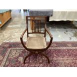 Antique mahogany elbow chair with pierced splat back and padded seat