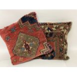 Pair of square cushions utilising sections of antique Persian rugs