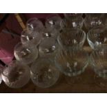 Eight hobnail style glass finger bowls, twelve sundae dishes, cake stand, bowls and water jug