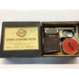 Wembley Sports Starting Pistol, boxed, autograph book and pair field glasses