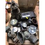 Group of old carriage lanterns, vintage cycle lights, glass chimneys etc