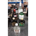 Seven bottles of alcohol - Barcadi, Lamb's Navy Rum, Gordon's Gin, Tia Maria, Napoleon Brandy x 2 an