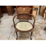 Late Victorian inlaid mahogany elbow chair with padded seat on cabriole front legs