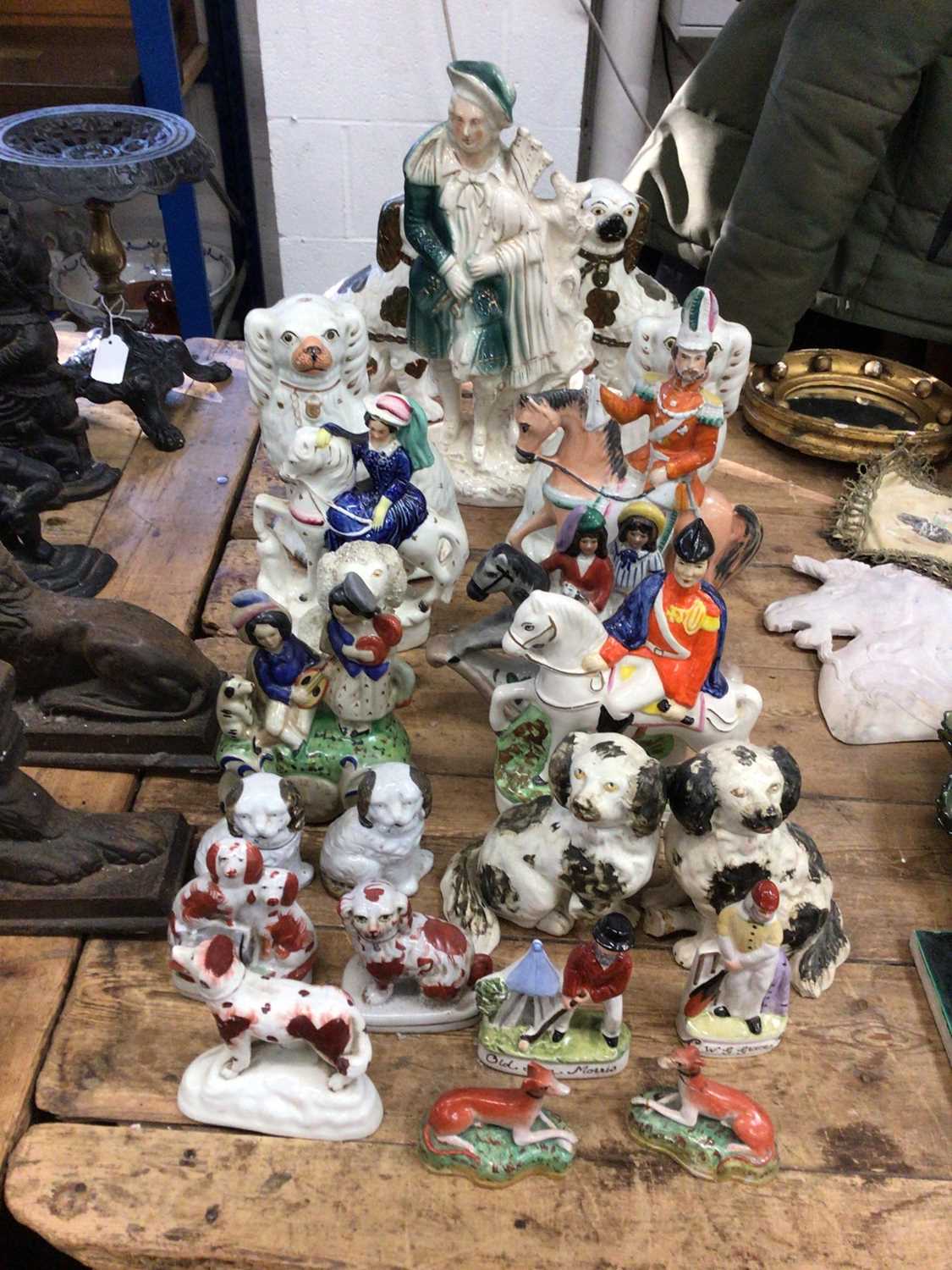 Collection of Staffordshire figures, including pairs of spaniels and greyhounds