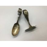 Silver christening spoon and pusher