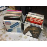 Selection of LP records including Miles Davis, Manhattan Jazz Quintet, Ray Charles, Quincy Jones, Ra