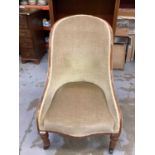 Victorian walnut tub-shaped chair with beige velvet upholstery