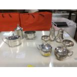 Group of silver crusts to include mustard pots, pepperetts and salt cellars (9 pieces)