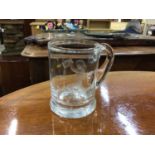 Glass mug engraved with Mythological figure to side