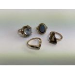 Four 9ct gold and gem-set dress rings