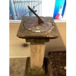 Carved stone garden sundial