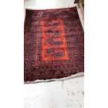 Afghan rug with blue decoration on red ground